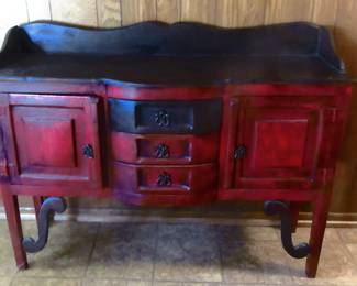 Vintage ornate side board, located in living area.