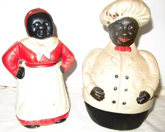 African American cast iron figures. stand about 8 inches tall. Age unknown.
