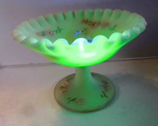 Fluted compote from previous photo under black light. Stands about 5 inches in height. More glass items coming soon.