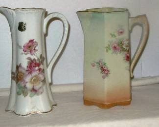 Tobacco tins, rare Nestles can, 2 pipe tobacco tins, two Bavarian pitchers.