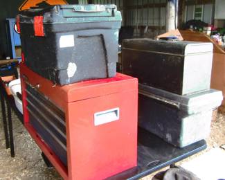 Old tool boxes with assorted misc. tools.
