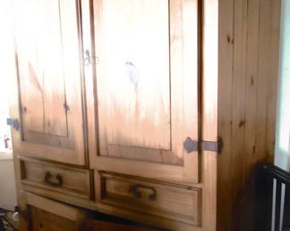 Large double door multi drawer wardrobe.