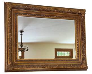 Huge gilded mirror
