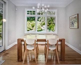 Beautiful solid blonde wood table and four Ikea chairs. Table is heavy and substantial. Purchased this set at an estate sale for $800 in 2021. Excellent condition.