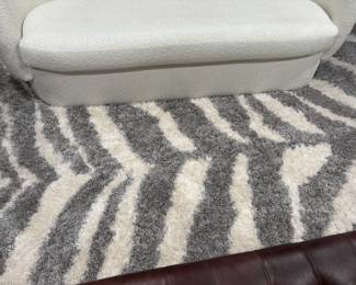Grey/Ivory 9x12 zebra print shag carpet purchased in 2021 from Overstock for $350. Very good condition, no stains.
