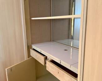 Inside of the armoire that opens to a bar  and or a lot of storage $150.00