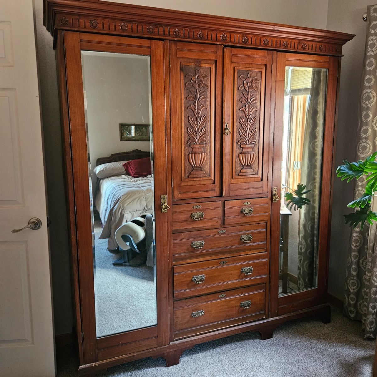 Late 19th Century Victorian Era Solid Wood Wardrobe with Mirrored Doors and lots of Inner Storage