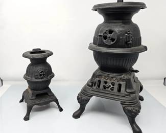 Two cast iron miniature parlor stoves, modeled after full-sized potbelly stoves from 1800's. Salesman Samples!