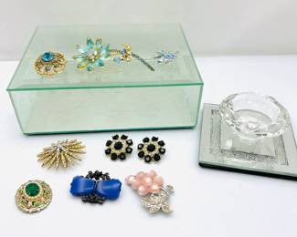 Lot #199 - Various vintage brooches and glass jewelry box plus candle holder
