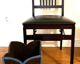 Chair and wood trash can
