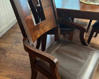 Beautiful dining room table..six chairs and one leaf...with the leaf it would accommodate 8-10 guest...