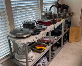 Kitchen...many appliances...pots...dishes...