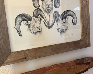 Jon Keger '94...wood piece has wolf drawings     Above is  " Fall Rams" by Doug Landstrand (signed/limited edition with stamp