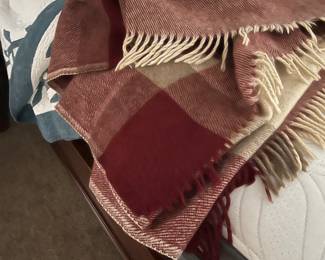 Red blanket (wool/from Iceland)...the other is Hawaiian Design by Tommy Bahama