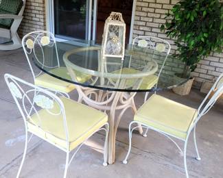 5-Piece Rattan Dining Set with Glass Top and 4 Wrought Iron Chairs featuring Yellow Cushions