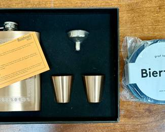Flask with shot glasses; felt coasters