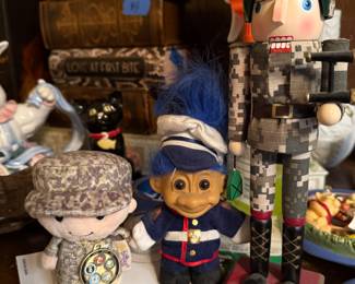 Russ Troll doll dressed in a U.S. Marine Corps & Nutcracker Traditional Christmas Military Soldier Nutcracker