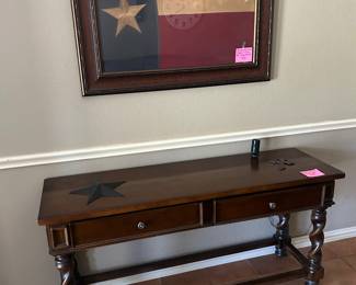 Sofa table and framed Texas Flag