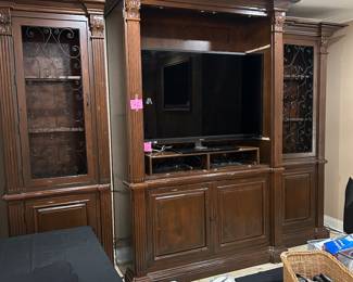 3 piece Entertainment center with large flat screen Smart TV