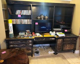 Custom made computer center with leather and western motif.