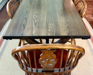 Vintage Oak Trestle Table with 6 Oak Windsor Splat Back Chairs. Table Features Extensions on each end for larger gatherings