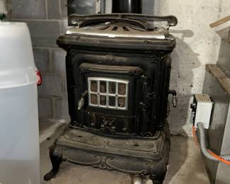 Antique cast iron wood parlor stove