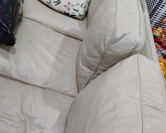 166. LEATHER SOFA $100