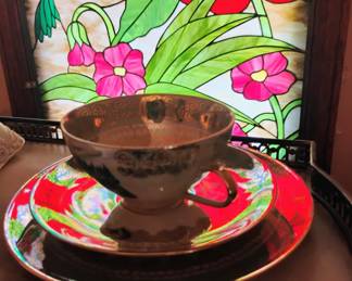 109. . CUP SAUCER AND PLATE $7
