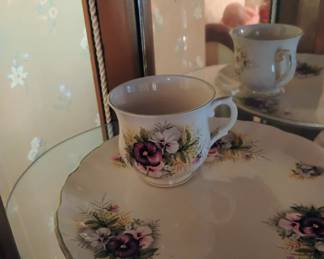 112. . CUP AND SAUCER $6