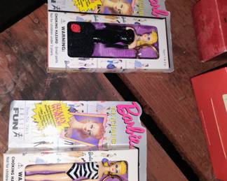 59.  SMALL BARBIES $5 EACH