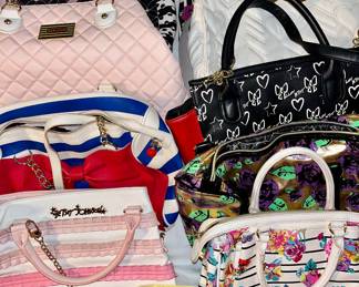 Betsy Johnson
Purses are in excellent condition.