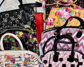 Betsy Johnson.
Purses are in excellent condition.