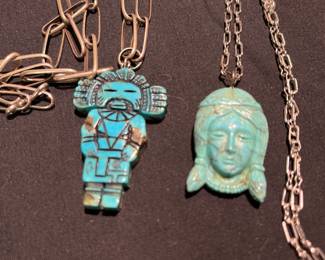 Turquoise kachina on handmade chain. Carved turquoise head on sterling chain
