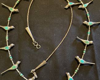 Cast sterling birds with turquoise inlay on liquid silver necklace with turquoise heishi beads. Unsigned.