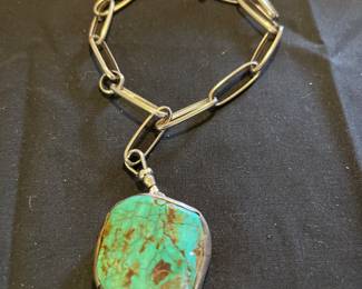 Heavy turquoise nugget on handmade chain by Loren Begay