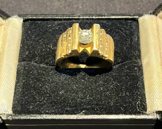14K .50 diamond center stone .50 accent diamonds. 9.2 gms