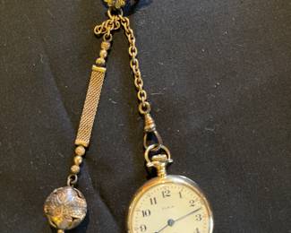 14k Elgin watch. It works. The fob is gold filled.