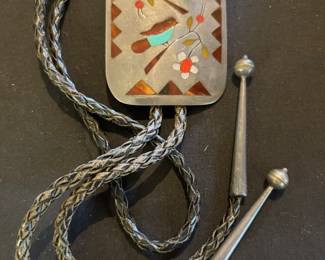 Sterling bolo unsigned. In style of Edaakie or The Guardians. Tortoise shell, turquoise, jet , mop and coral.