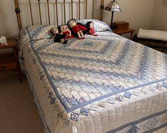 Antique Brass Bed
Beautiful Quilt 
Betty Boop Dolls