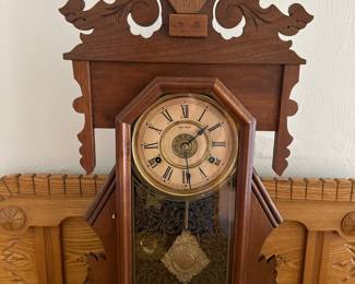 Antique New Haven Clock Co. 
Time & Strike mantle Click. 
Works Great!