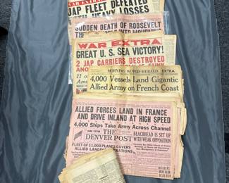 WWII era group of US newspapers with war related headlines