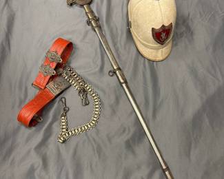 Knights of Pythias Ceremonial sword, belt and pith helmet dated early 20th century.