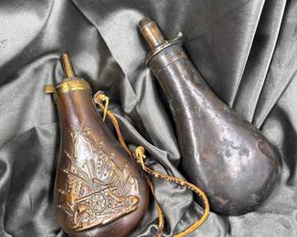 Antique style Gunpowder flasks, dates unknown.