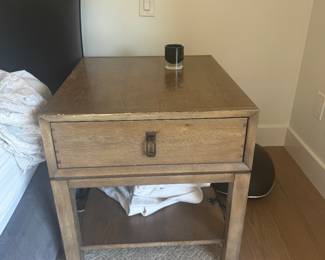 Two solid wood side tables or nightstands. These tables and nightstands are used and they are by a very high-end furniture brand asking $150 for each or 250 for both one of them is missing the handle but anything can be used in place of it. They are soft close and very heavy