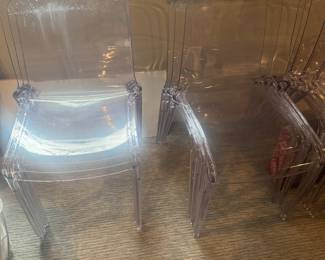 Six acrylic dining chairs with scratches each chair retailed for $300. I’m selling all six for $300.