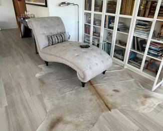 Chaise Lounge 29 1/2" wide by 68" long by 37" tall. Cow hide rug (NOT LUCITE TABLE)