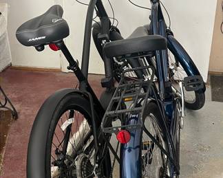 Trek Electric touring bike, with Bosch motor, almost new includes charger and batteries with locks. Bikes have been updated with less than 200 driven miles!