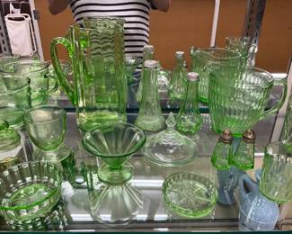 Green Uranium Glass Assorted Items including Pitchers, Salt & Pepper Shakers, Measuring Cup, Glasses, Sherbert Cups, Lids