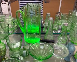 Green Uranium Glass Assorted Items including Pitchers, Salt & Pepper Shakers, Measuring Cup, Glasses, Sherbert Cups, Lids
