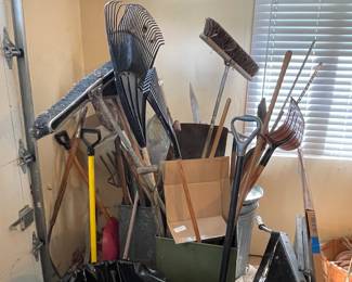 Shovels, rakes brooms and other various tools 